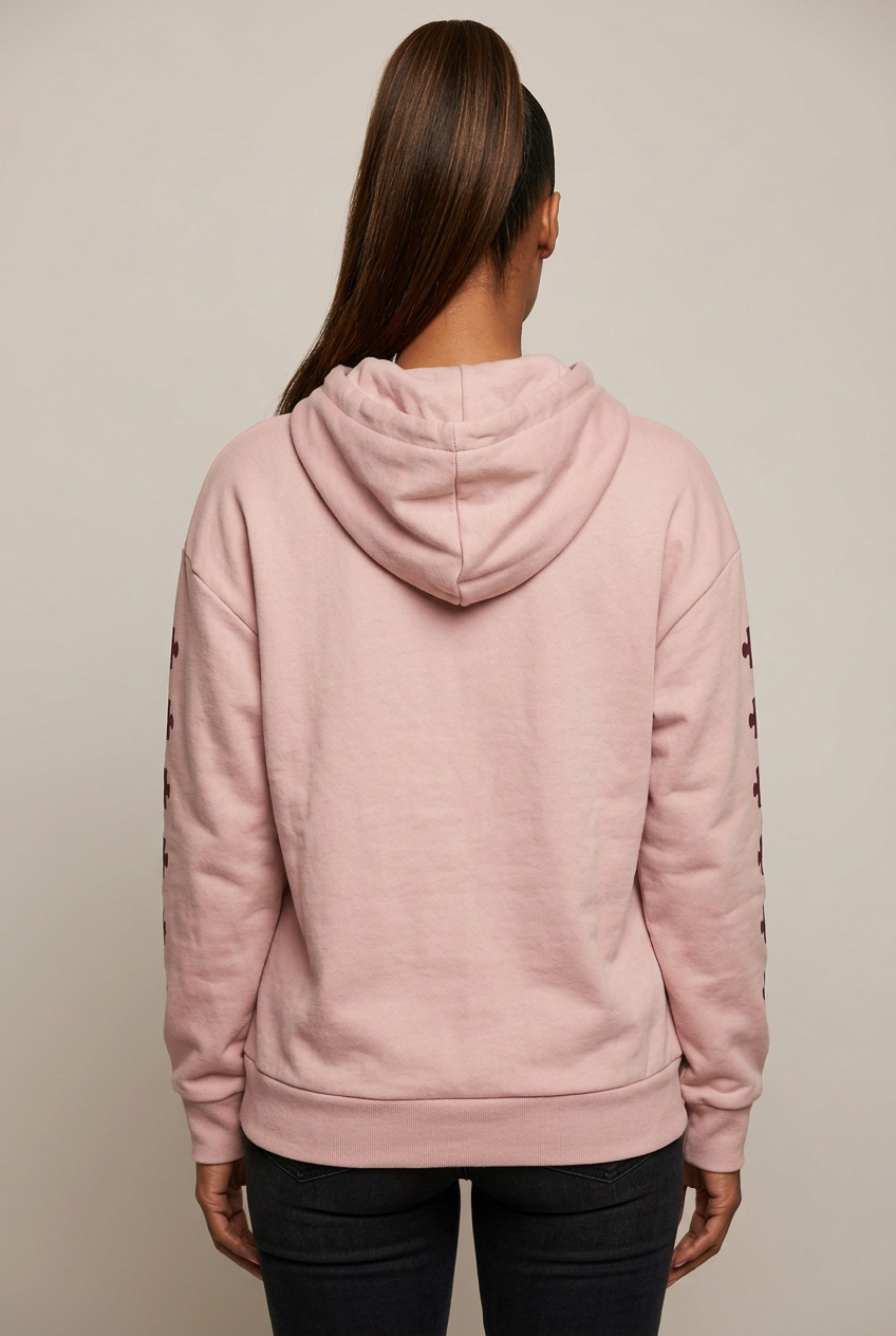 Back view of the pink Dborra hoodie on an adult female model