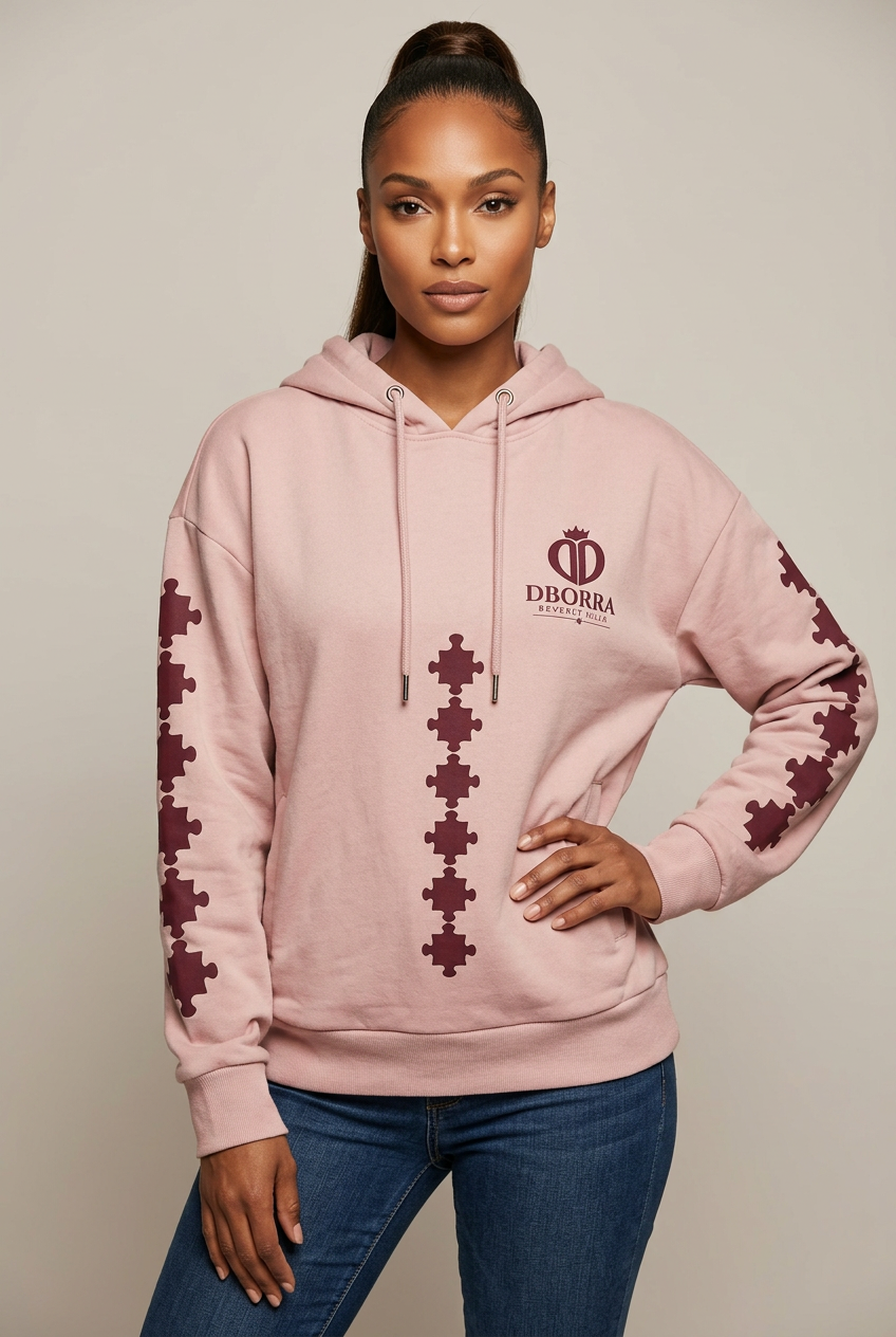 Dborra pink hoodie on an adult woman in an editorial pose