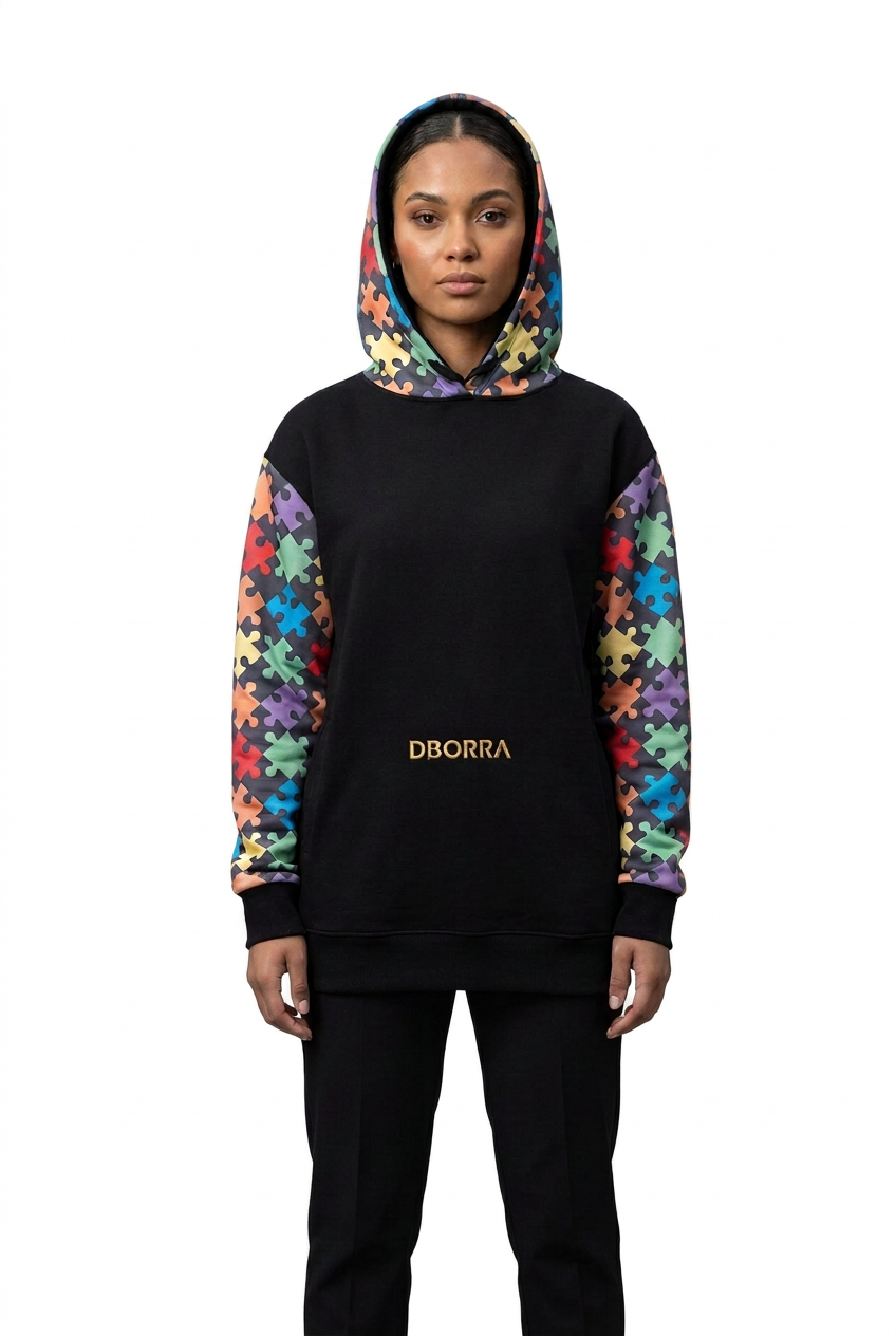Female model in the black Dborra hoodie on pure white