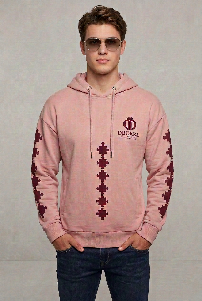 Male model with a leaner silhouette wearing the pink Dborra hoodie
